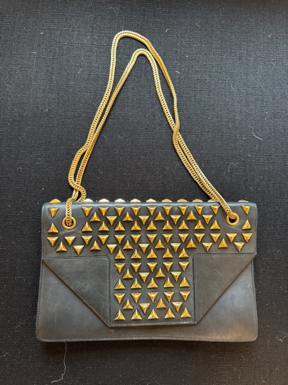 Saint Laurent Studded Black Leather Shoulder Bag with Gold Accents